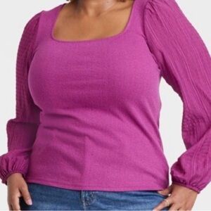 Purple long sleeve blouse with square neckline and puffy sleeves